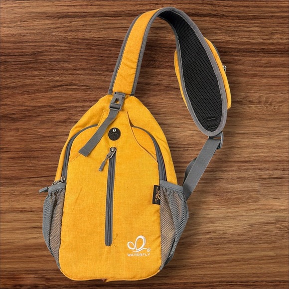 Waterfly Sling Backpack Crossbody Shoulder Bag Travel Hiking Yellow - Picture 1 of 6